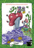 A whimsical card from The Healthy Witch Oracle Cards by Schiffer Publishing, Ltd. depicts a red-and-white mushroom with purple liquid, flowers, vines, and butterflies and features the words "Liver" and “Spirit/Spring/Ostara/Beltane/Spring Equinox.”.