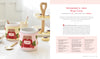 HeartFELT Crafts to Make and Give by Schiffer Publishing, Ltd. shows two mugs in pink strawberry jam cozies beside pastries and a bowl. The book features beginner felt crafts, a mug cozy recipe, and a detailed materials list.