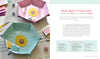 HeartFELT Crafts to Make and Give by Schiffer Publishing, Ltd. features pink and teal felt hexagon trinket dishes with embroidered beehive and bee designs—perfect beginner projects, pictured with thread, scissors, and felt on a light surface.