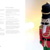 The "Cozy Christmas Crochet" book by Schiffer Publishing, Ltd. features a crocheted nutcracker doll with a black hat, white beard, red and gold uniform, and green sleeves; mustache and beard pattern instructions appear on the left page.