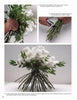 Three images from Schiffer Publishing, Ltd.'s "Creating Floral Centerpieces" show hands arranging and trimming white roses with green leaves, demonstrating bouquet tying techniques; the finished bouquet rests on a white surface.