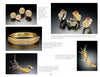 A page from Schiffer Publishing, Ltd.’s *Art Jewelry Today 3* showcases six intricate gold pieces—earrings, rings, a bangle, brooch, and bird-shaped pin—each adorned with diamonds, sapphires, rubies, and tourmalines.