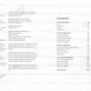 A contents page from "Wreaths" by Schiffer Publishing, Ltd. displays section titles and page numbers on the left, with modern botanical wreaths and dried floral arrangements along the right edge against a white wooden backdrop.