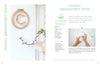 The Little Book of Flower Pressing by Schiffer Publishing, Ltd. features an embroidery hoop with pressed flowers, displayed on a white wall above a plant, and includes step-by-step photos and a materials list for your own floral embroidery project.